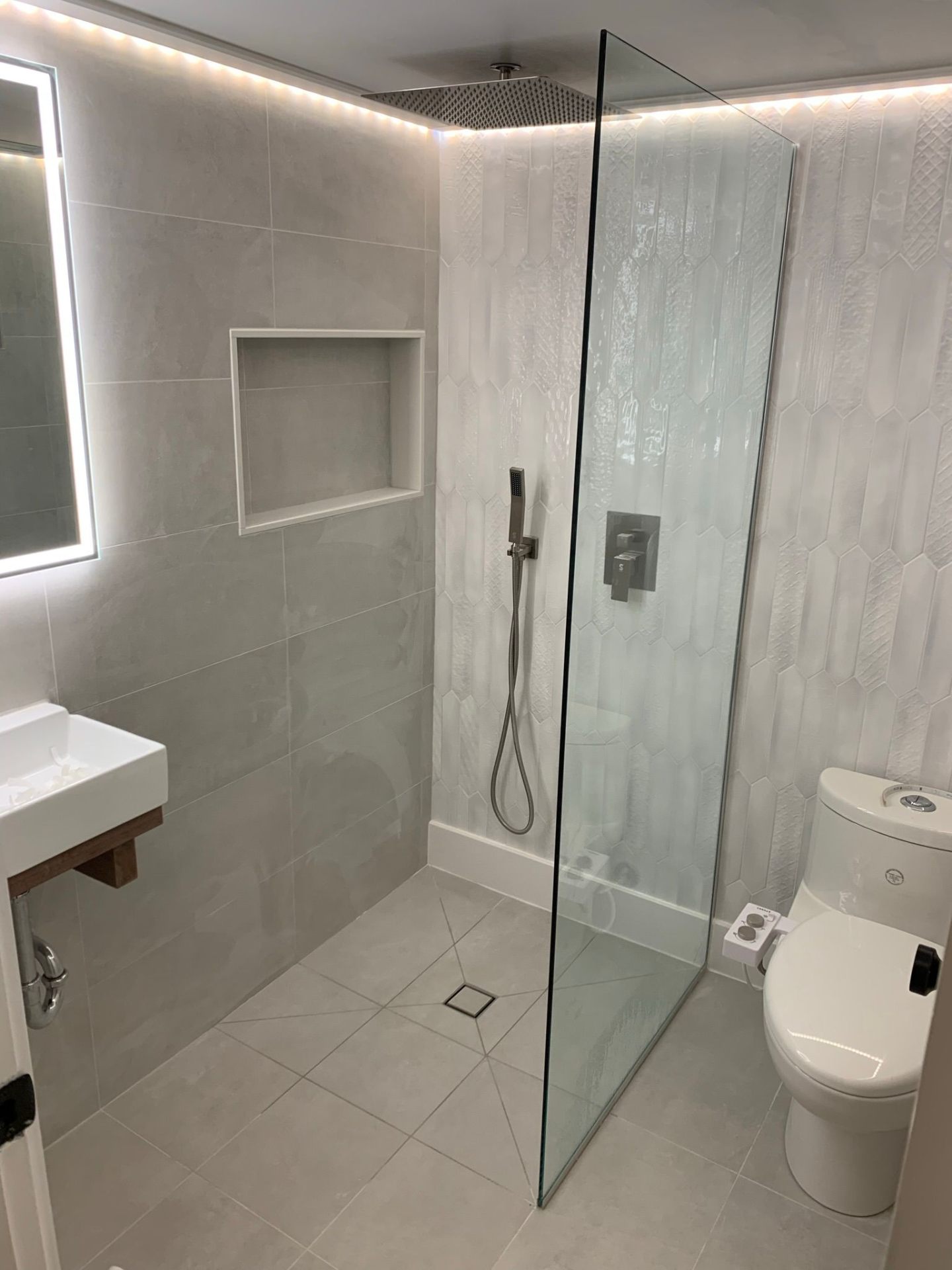 Modern bathroom with hex tile shower
